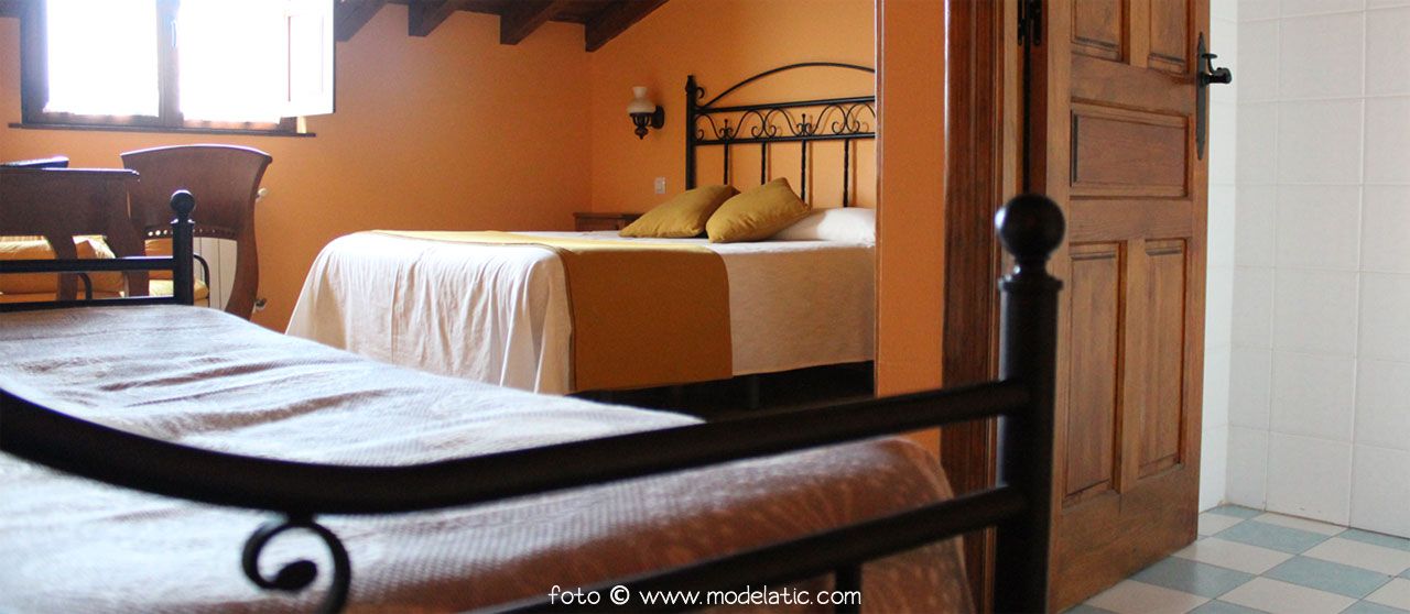 Habitación Triple de la Posada Rural El Rincón de Cabrojo con tres camas
